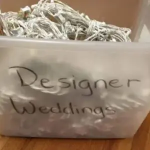 A container of wedding paper on the floor