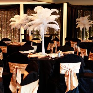 A room with many tables and chairs in it