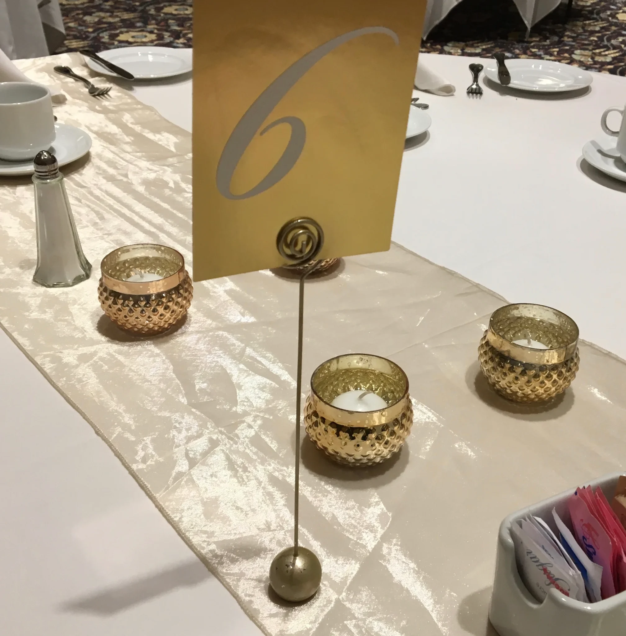 A table with a number six on the top of it.