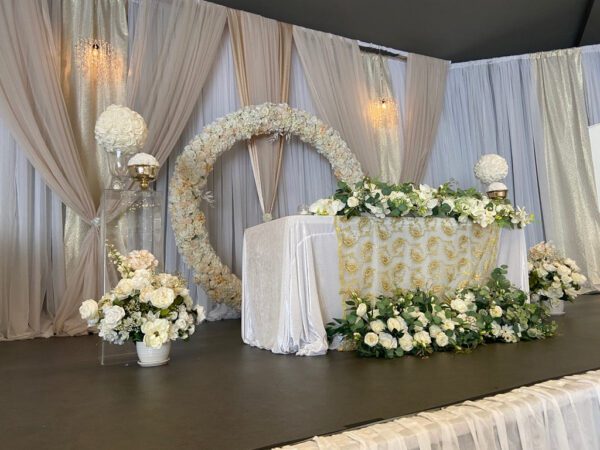 A wedding table with flowers and decorations