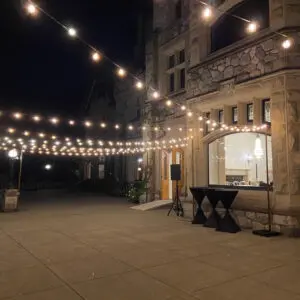 A building with lights hanging from the ceiling.