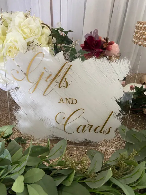 A sign that says gifts and cards