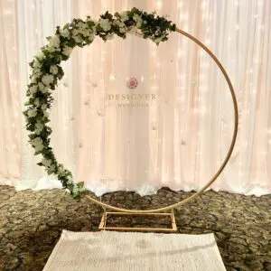 Round gold archway by Designer Weddings