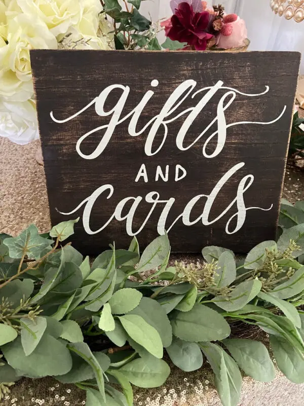 A sign that says gifts and cards