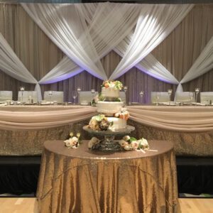 A wedding cake on top of a table.