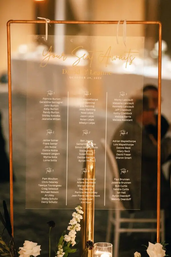 A glass table with a menu on it