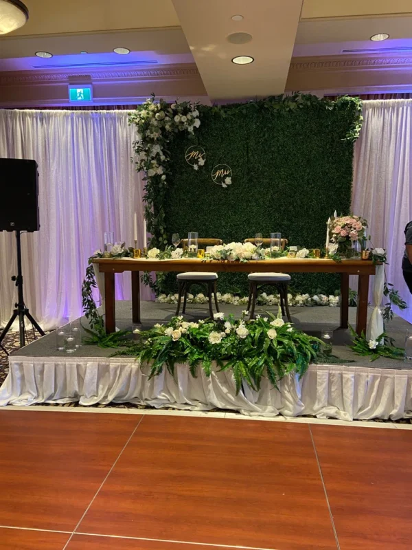 A table with flowers and candles on it