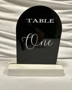 A table number is displayed on a stand.