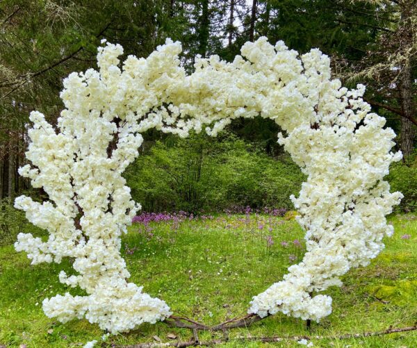 White flower Archway by Designer Weddings