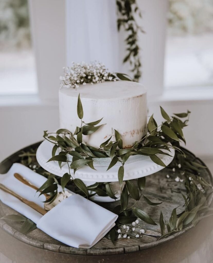 white cake pedestal