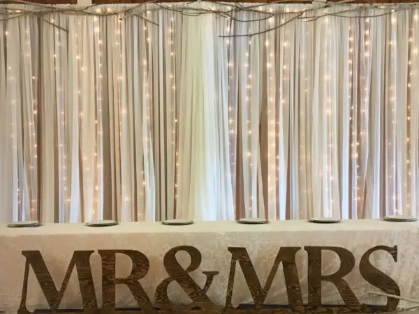 A large wooden sign that says mr and mrs.