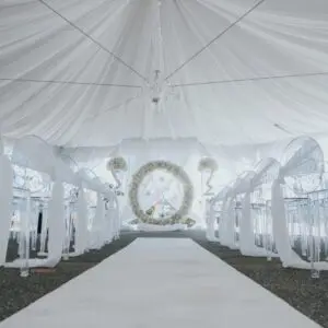 A white carpet and a large clock in the middle of it