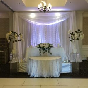 White pintuck backdrop Package by Designer Weddings