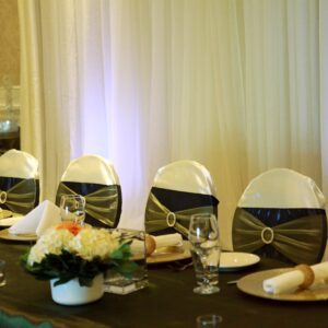 A table set with plates and napkins on it