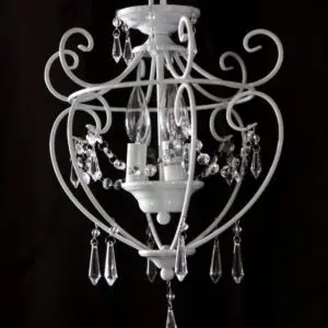 A chandelier with glass beads hanging from the bottom.