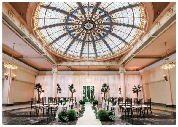 A large room with many chairs and tables