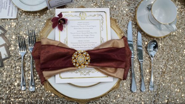 A table set with silverware and place settings.