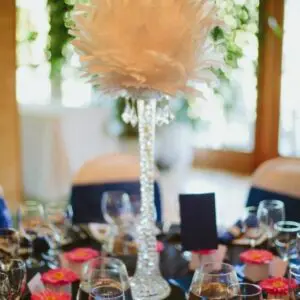 A table with glasses and candles on it