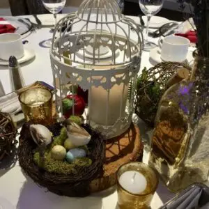 A table with candles and decorations on it