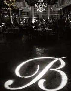 A large room with a big light up letter