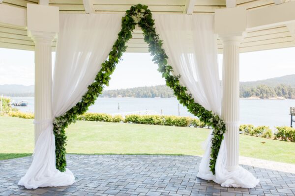 DIY Greenery Backdrop by Designer Weddings