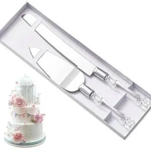 A cake server set with two spatulas and one knife.