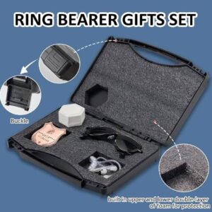 A set of three items that include a ring bearer gift set.