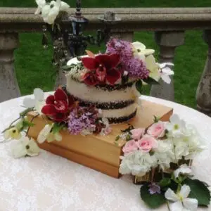 A cake with flowers on top of it.