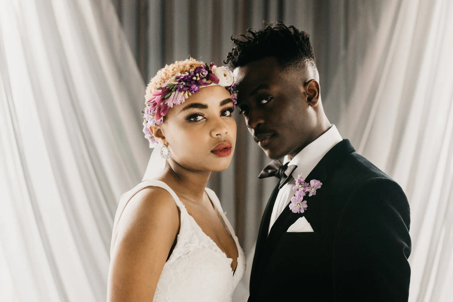 A man and woman posing for the camera.