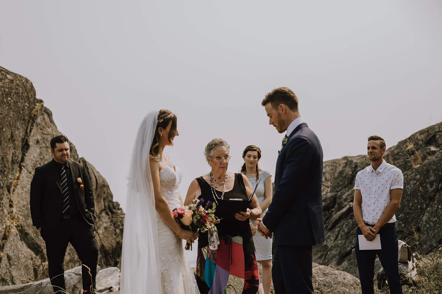 A couple getting married on the beach