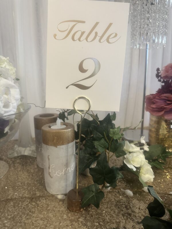 Gold table number stand with wooden base