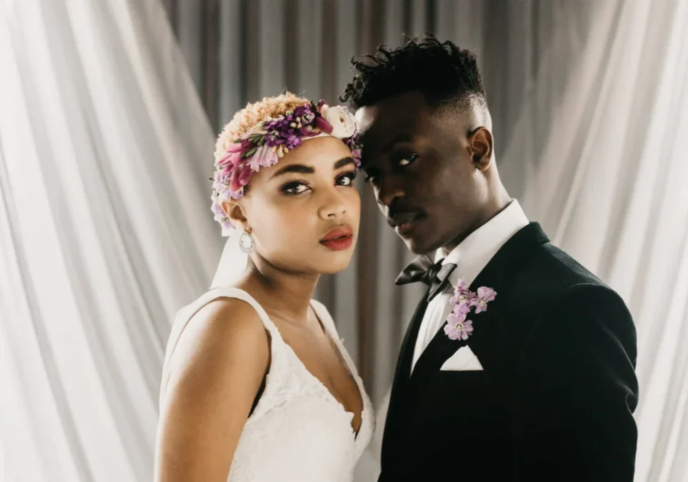 A man and woman posing for the camera.